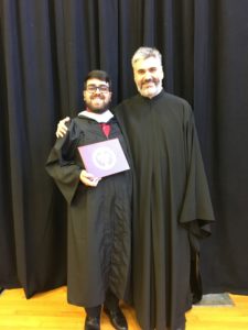 Kamal Hourani at Hellenic College's 2019 graduation ceremony with his teacher, Fr. Romanos Karanos.